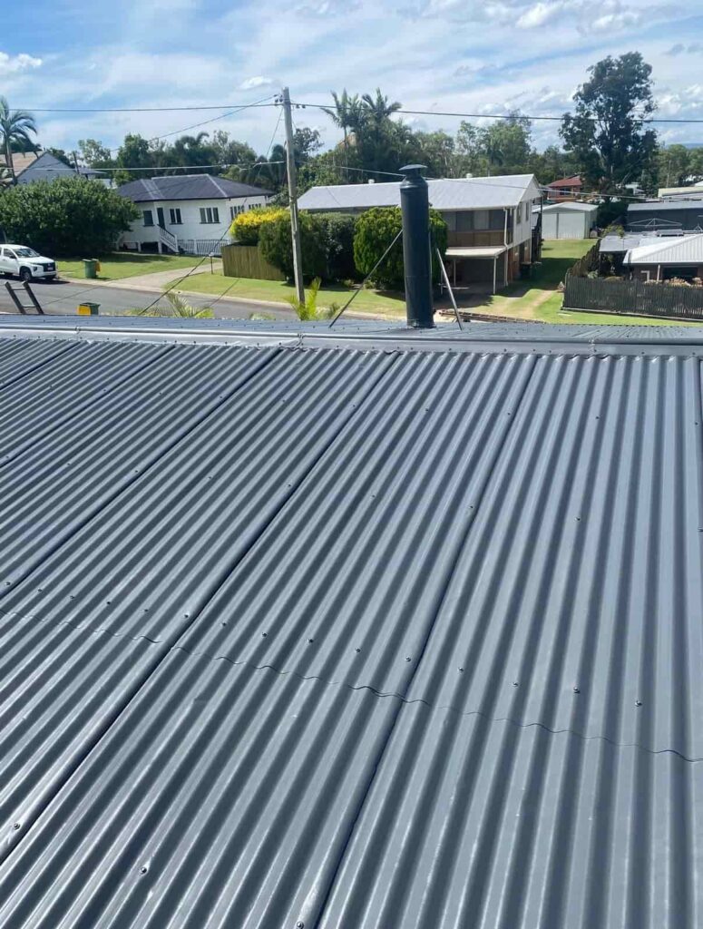New painted metal roof after a complete roof restor